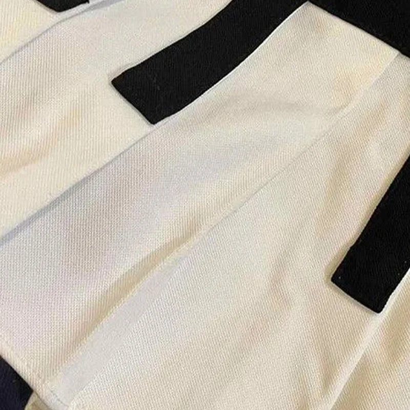 Spring black and white spliced women's short skirt with sweet and spicy style pleated skirt and waist cinching skirt - Image 5