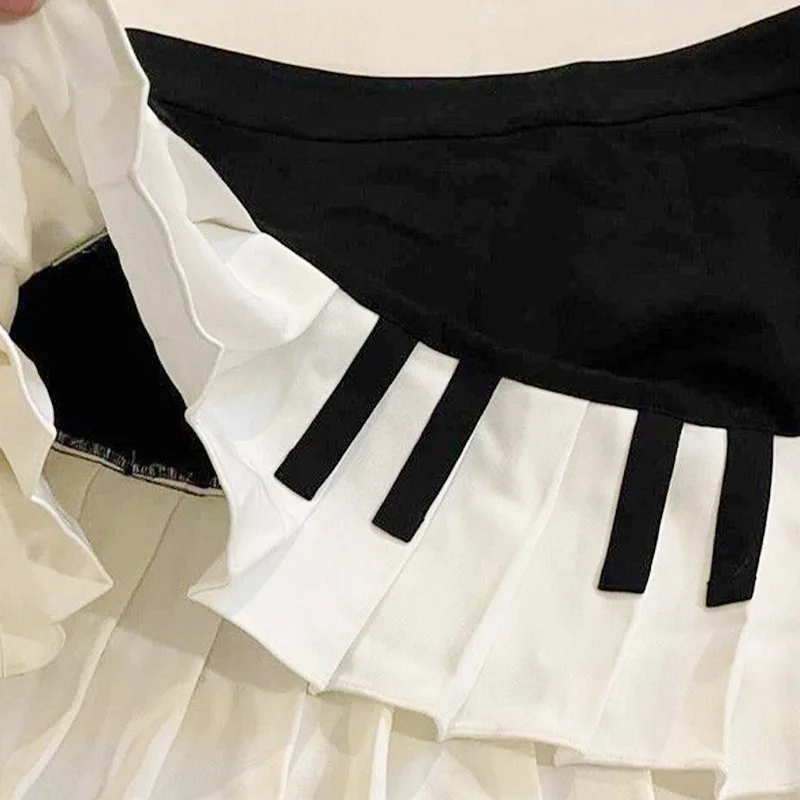 Spring black and white spliced women's short skirt with sweet and spicy style pleated skirt and waist cinching skirt - Image 6