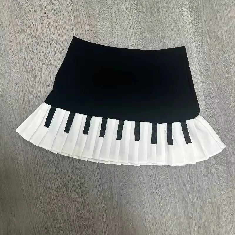 Spring black and white spliced women's short skirt with sweet and spicy style pleated skirt and waist cinching skirt